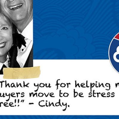 A black and white photo of a smiling couple, set against a blue background with a red and blue Interstate 85 sign, and a testimonial from "Cindy" saying, "Thank you for helping my buyers move to be stress free!!"